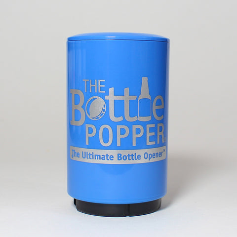 The easy-to-use, automatic Original Bottle Popper - Blue effortlessly pops off and captures the cap of your favorite beer or bottled beverage in one swift, push-down motion - and as a fully portable device, its perfect for tailgates, barbecues, home bars and more.